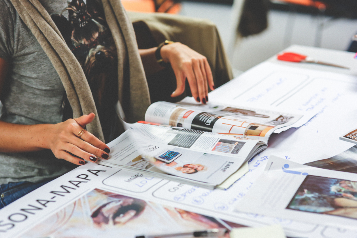 Woman flicking through a magazine